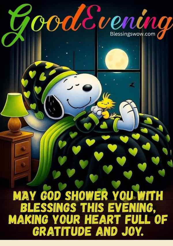 Snoopy in pajamas resting peacefully in bed at night, shown with a good evening prayer and blessings